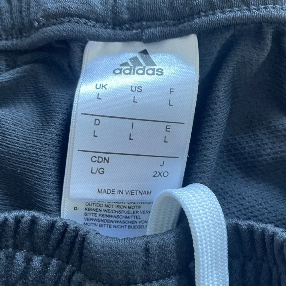adidas Men's Black Athletic Shorts with White Chevron Stripes size L